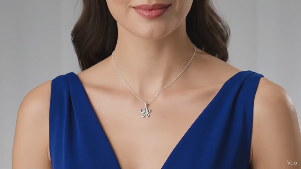 Open-work flower pendant.